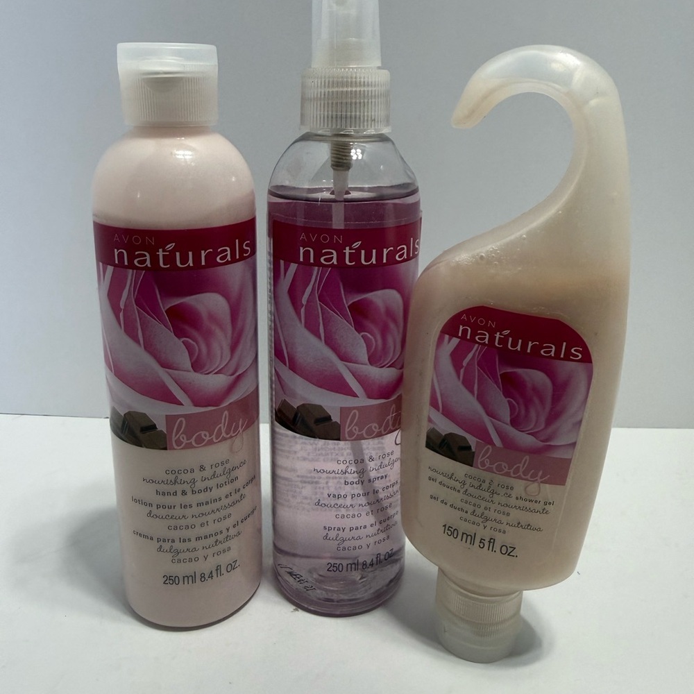 Avon Naturals Cocoa & Rose body lotion, body spray, and shower gel.